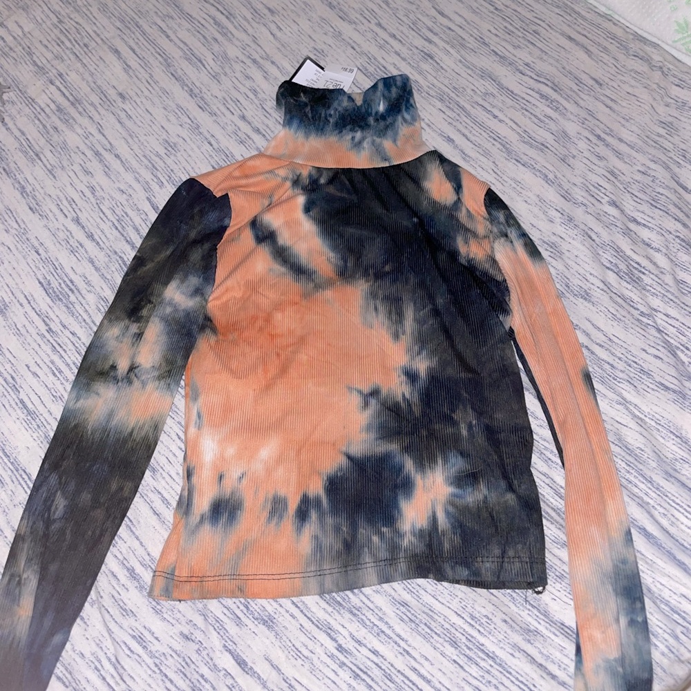 A Classy red and blue turtleneck long sleeve. Great for 4th of July!